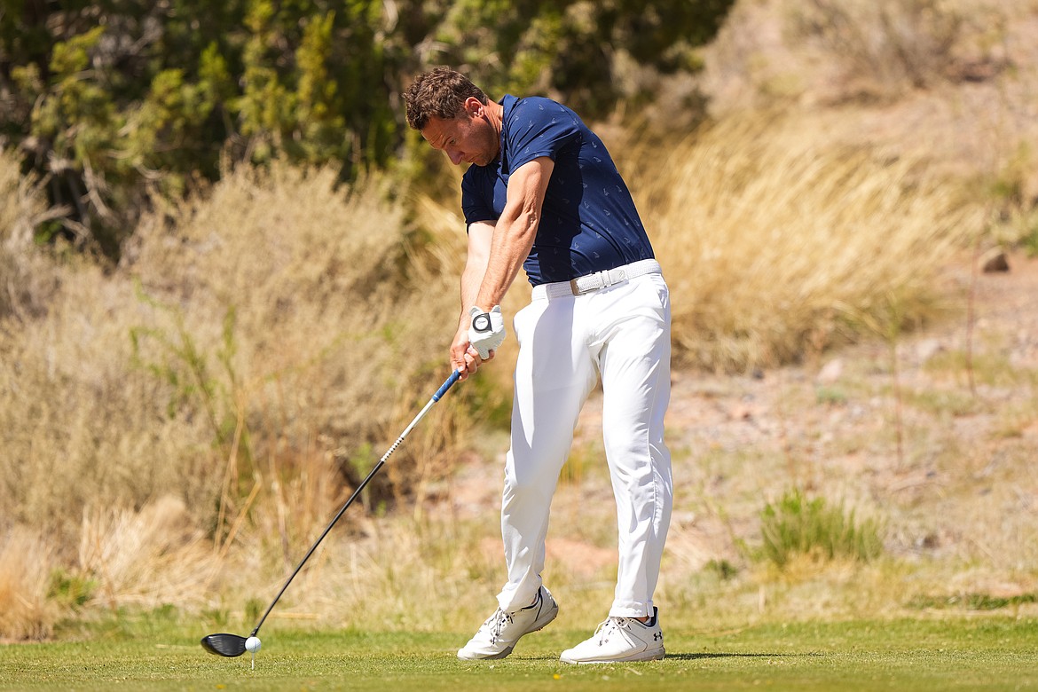 DARREN CARROLL/PGA of America
North Idaho College golf coach Russell Grove hits his tee shot on the 16th hole during the first round of the 55th PGA Professional Championship at Twin Warriors Golf Club on April 30.