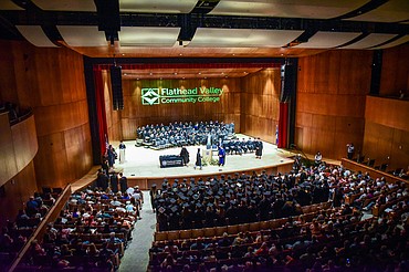 Graduates file onto the stage to receive their diplomas at Flathead Valley Community College's Class of 2023 commencement ceremony inside McClaren Hall at the Wachholz College Center on Friday, May 12. A total of 268 graduates were honored receiving 288 degrees and certificates. (Casey Kreider/Daily Inter Lake)