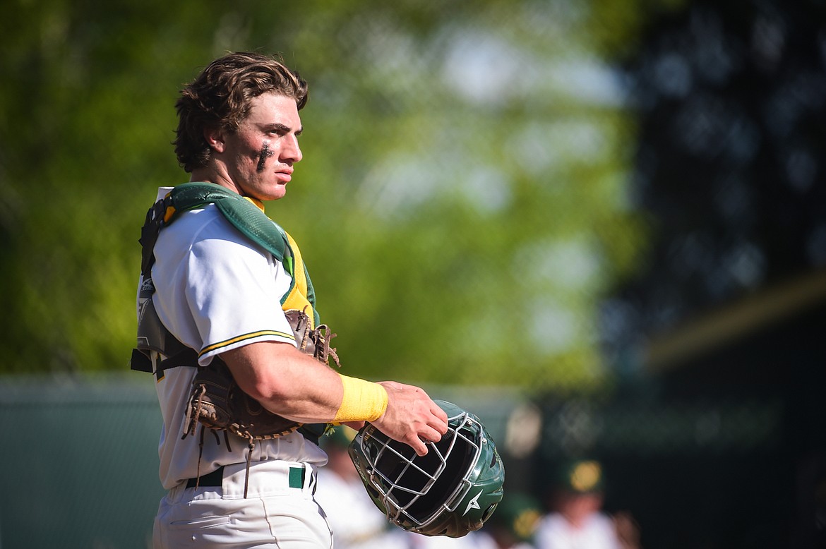 Whitefish catcher Fynn Ridgeway (7) looks out over the infield between outs against the Hamilton Broncs in the Sapa-Johnsrud Baseball Invitational at Memorial Field in Whitefish on Saturday, May 13. (Casey Kreider/Daily Inter Lake)