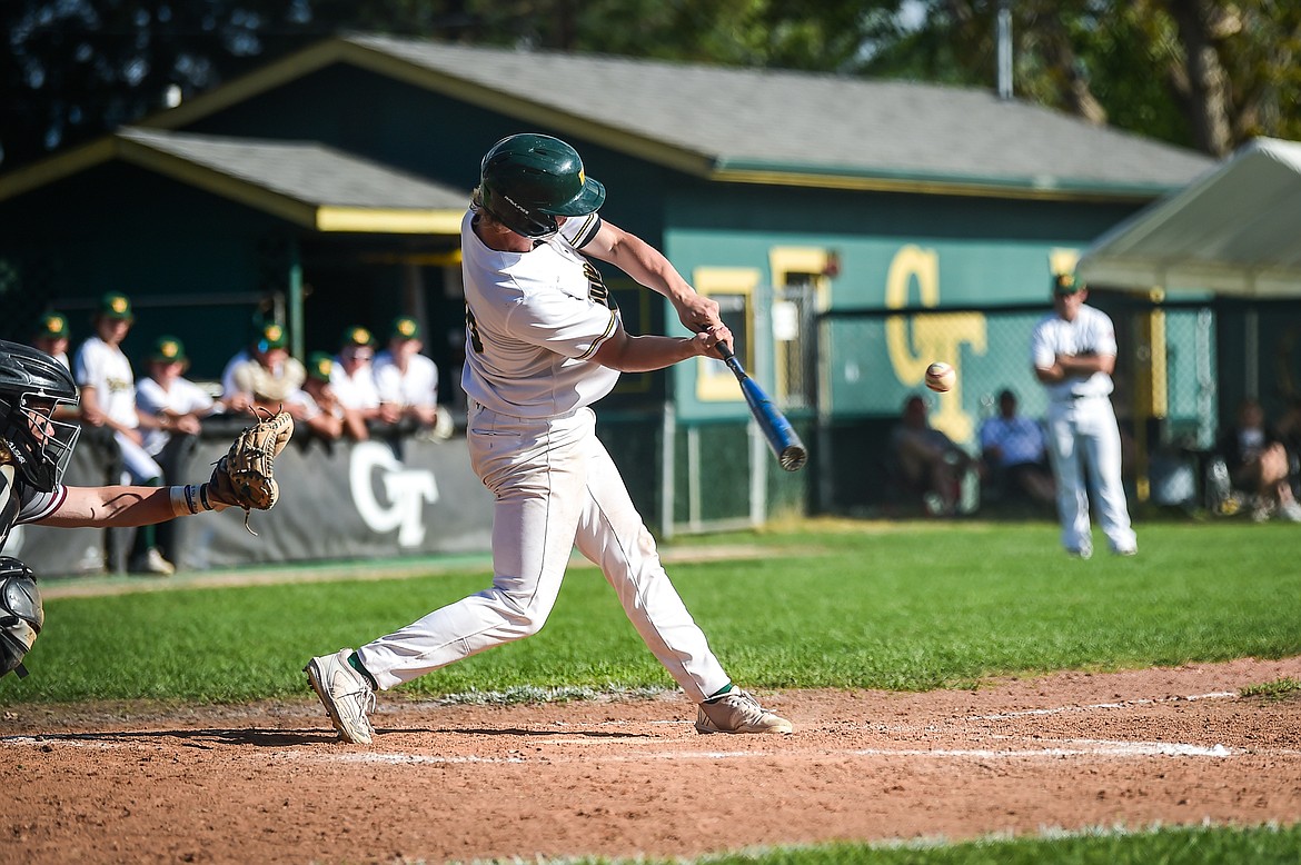 Whitefish's Jake McIntyre (10) connects on a three-run home run in the sixth inning against Hamilton in the Sapa-Johnsrud Baseball Invitational at Memorial Field in Whitefish on Saturday, May 13. (Casey Kreider/Daily Inter Lake)