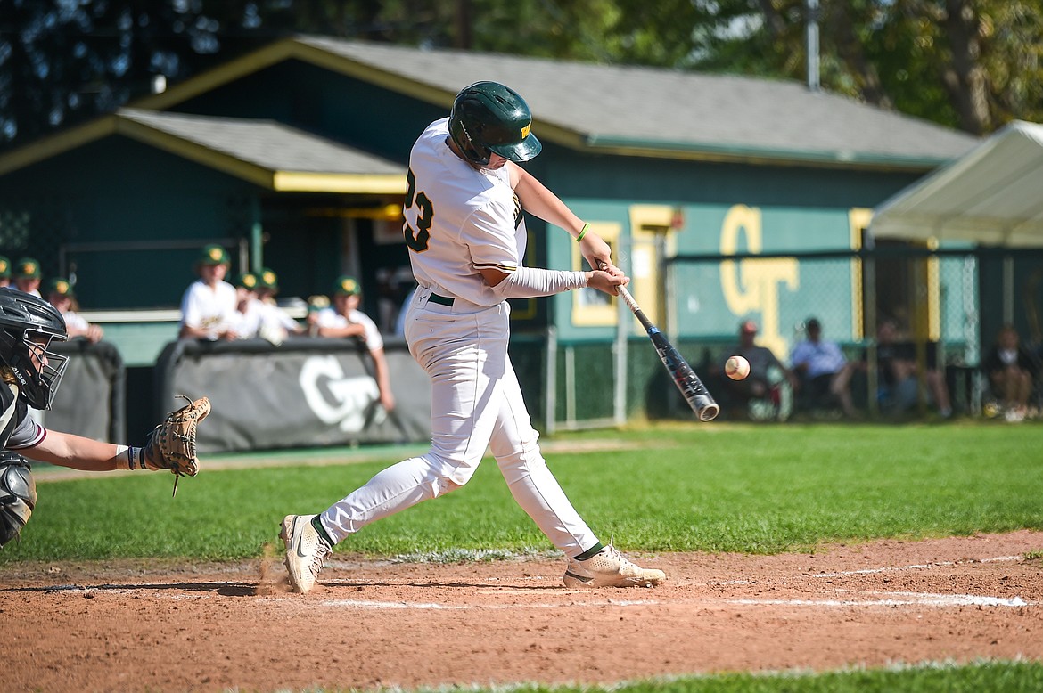 Whitefish's Ty Schwaiger (23) drives in a run with a bases-loaded single in the fifth against Hamilton in the Sapa-Johnsrud Baseball Invitational at Memorial Field in Whitefish on Saturday, May 13. (Casey Kreider/Daily Inter Lake)