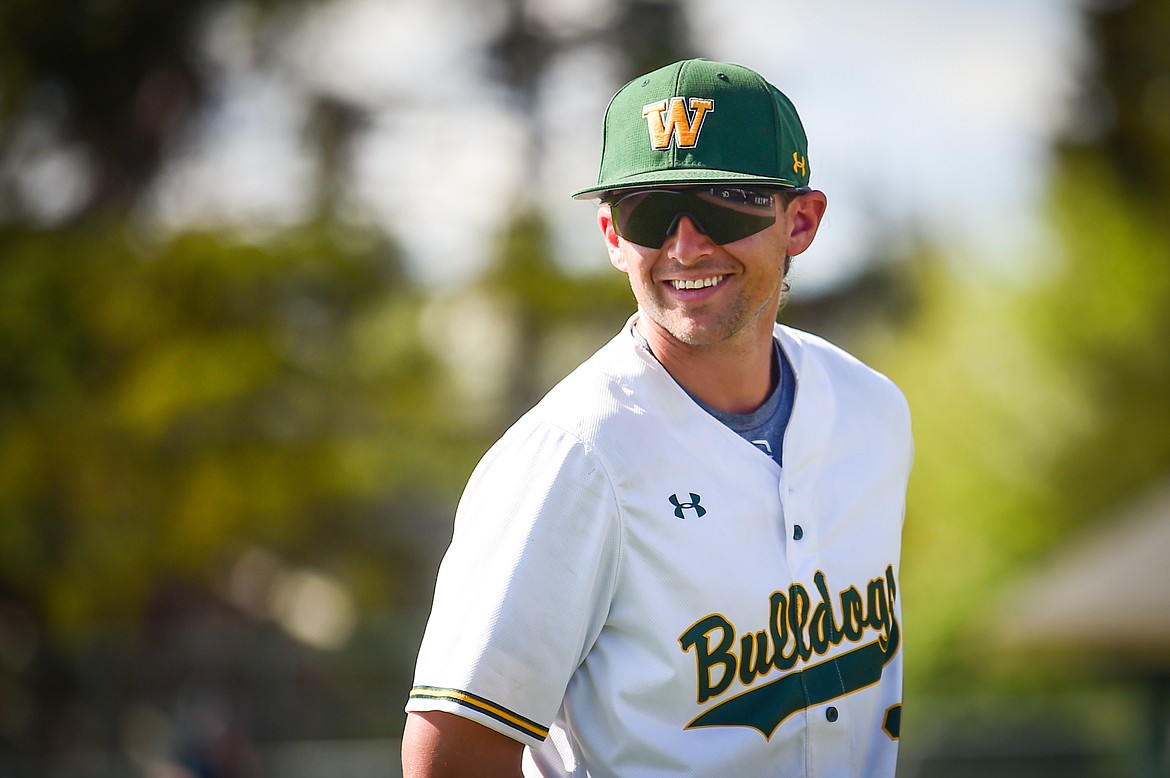 Whitefish baseball coach Kyler Blades on the third baseline as the Bulldogs take on the Hamilton Broncs in the Sapa-Johnsrud Baseball Invitational at Memorial Field in Whitefish on Saturday, May 13. (Casey Kreider/Daily Inter Lake)