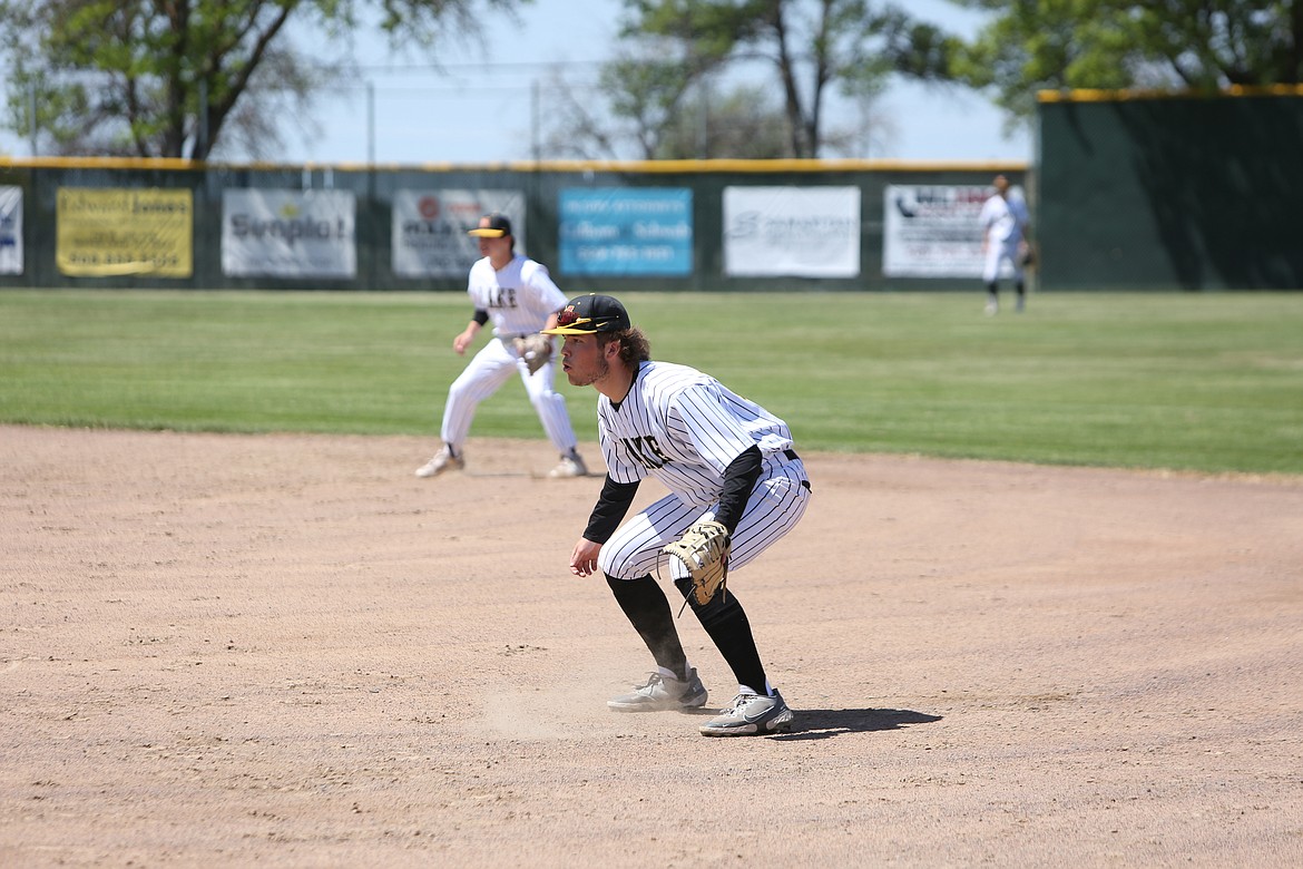 Moses Lake first baseman Josh West looks toward an Eastmont batter in the top of the third inning against the Wildcats.