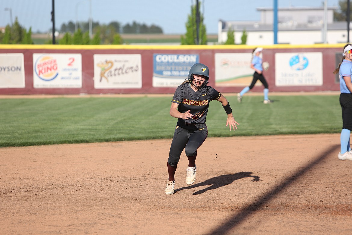 Moses Lake junior Kendall Reffett runs to third base during the nightcap of Friday’s doubleheader against Eastmont.