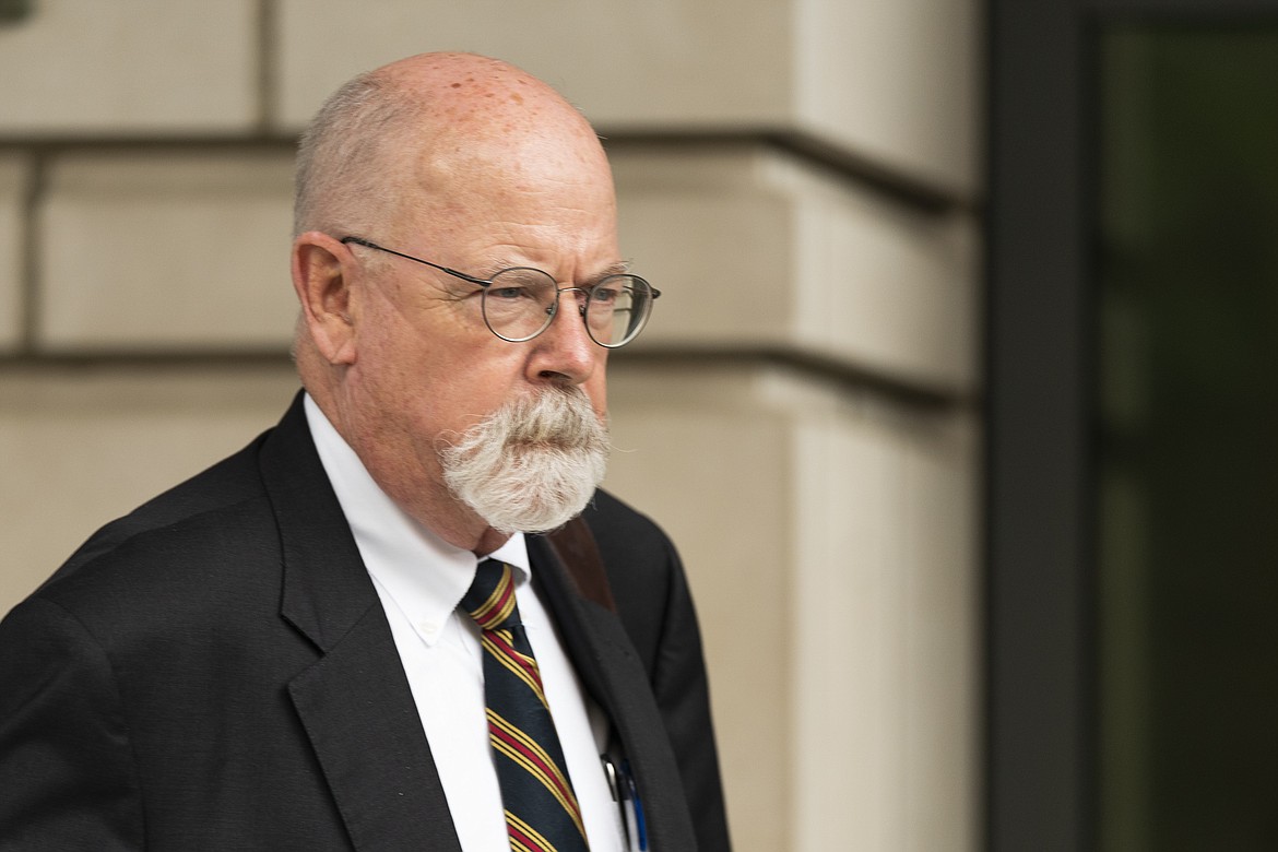 Special counsel John Durham, the prosecutor appointed to investigate potential government wrongdoing in the early days of the Trump-Russia probe, leaves federal court in Washington, May 16, 2022. Durham ended his four-year investigation into possible FBI misconduct in its probe of ties between Russia and Donald Trump’s 2016 presidential campaign. The report Monday, May 15, 2023, from Durham offers withering criticism of the bureau but a meager court record that fell far short of the former president’s prediction he would uncover the “crime of the century.” (AP Photo/Manuel Balce Ceneta, File)