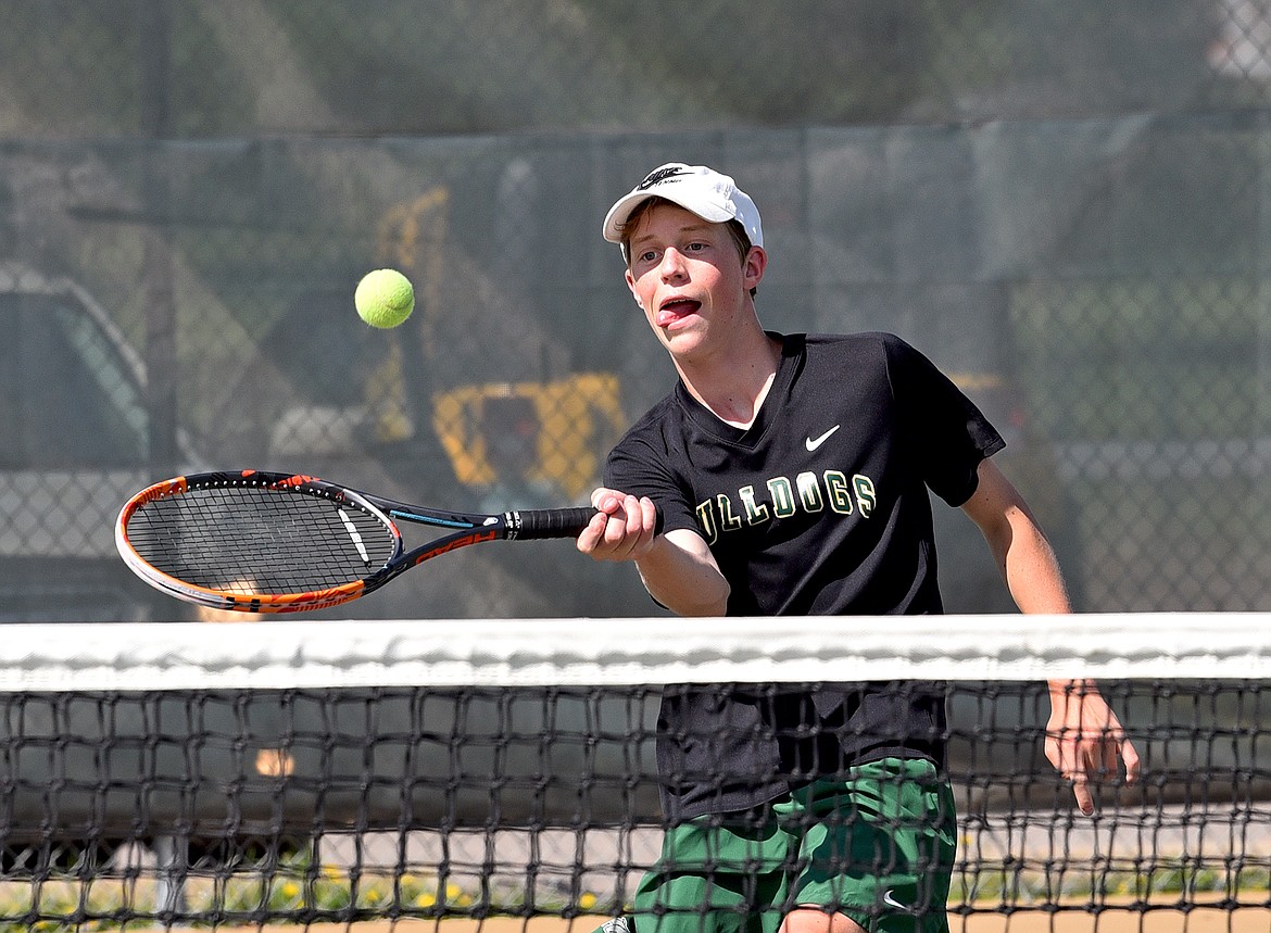 Bulldog freshman Jack Oehlerich plays in the No. 1 singles match against against Polson on Thursday in Whitefish. (Whitney England/Whitefish Pilot)