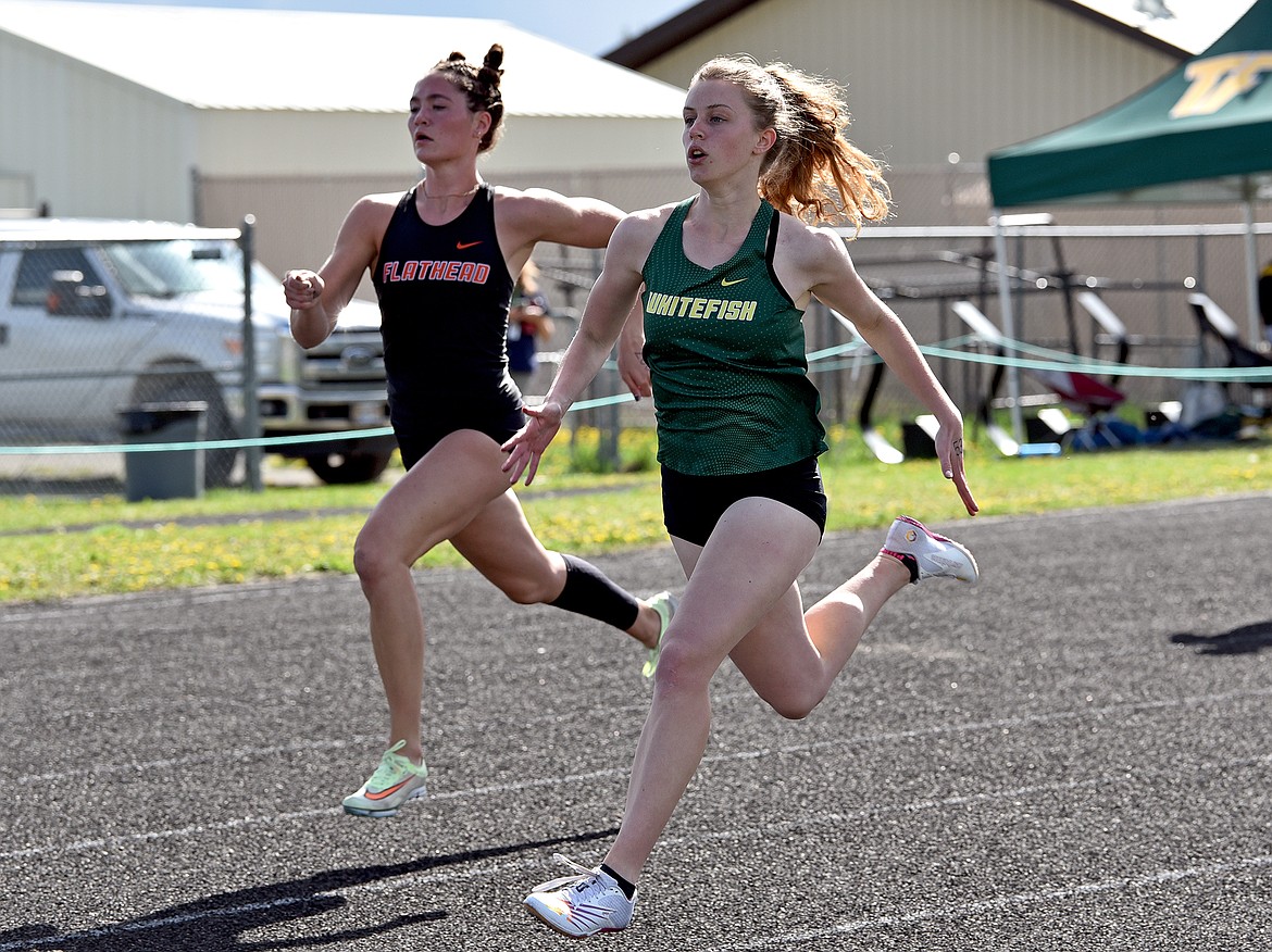 Bulldog sophomore Rachael Wilmot runs in the 400 meter race at the Whitefish Triangular track meet on Thursday. (Whitney England/Whitefish Pilot)