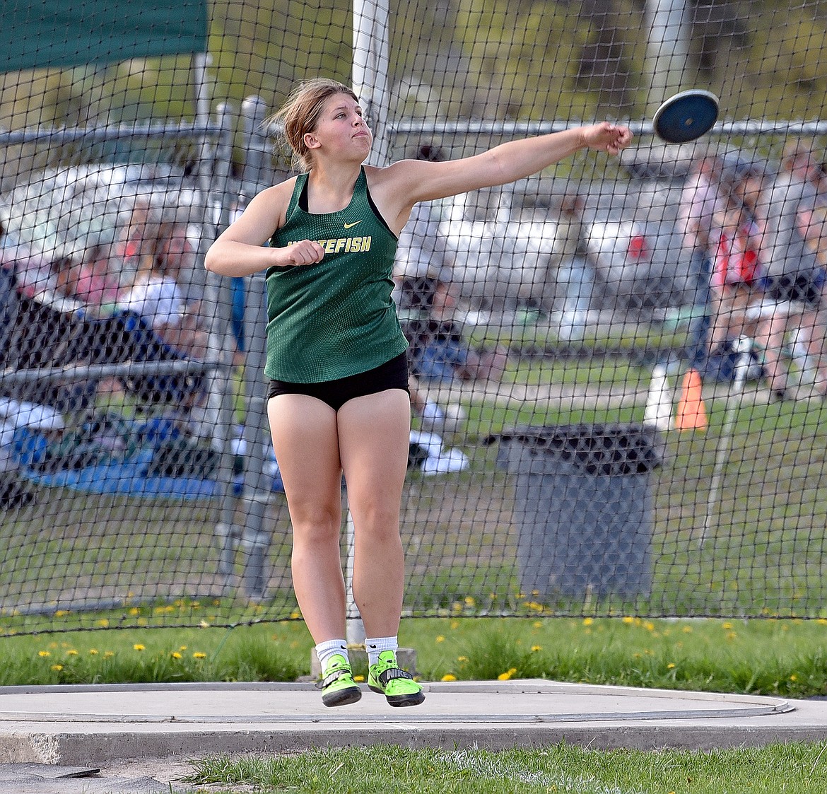 Whitefish's Drew Steele competes in discus at the Whitefish Triangular track meet on Thursday. (Whitney England/Whitefish Pilot)