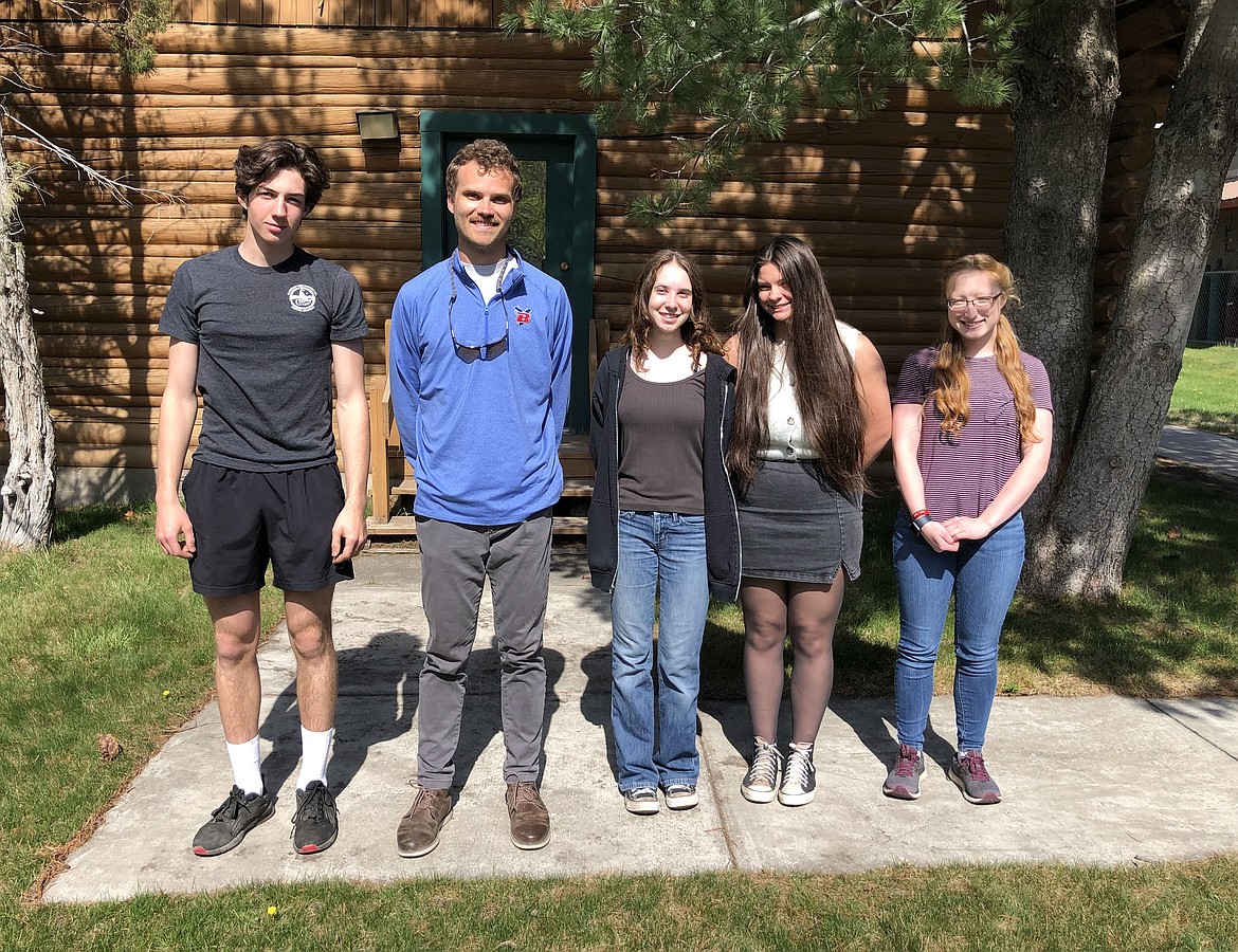 Bigfork High School student Wyatt Barnes, left, received a $300 prize for his winning poem in the Authors of the Flathead's annual writing competition. Also pictured is English teacher Caleb Seeton and other award winners, Abby Curtis, Keeva Clark and Erika Dowling, all of Bigfork High School. (Photo provided by Craig Thomas Naylor)