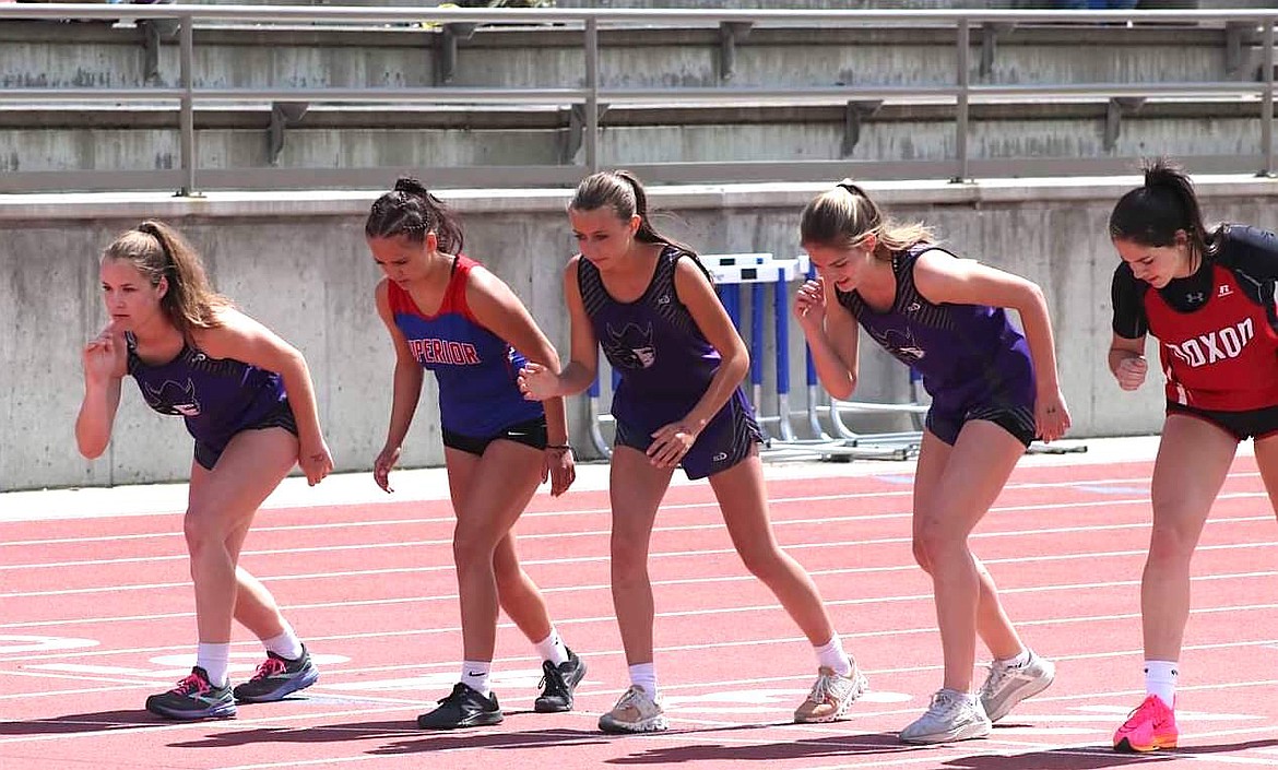 Charlo girls get ready to compete in the 1,600-meter run at last week's district meet in Missoula. Aida Cote took second in the race. (Michelle Sharbono photo)