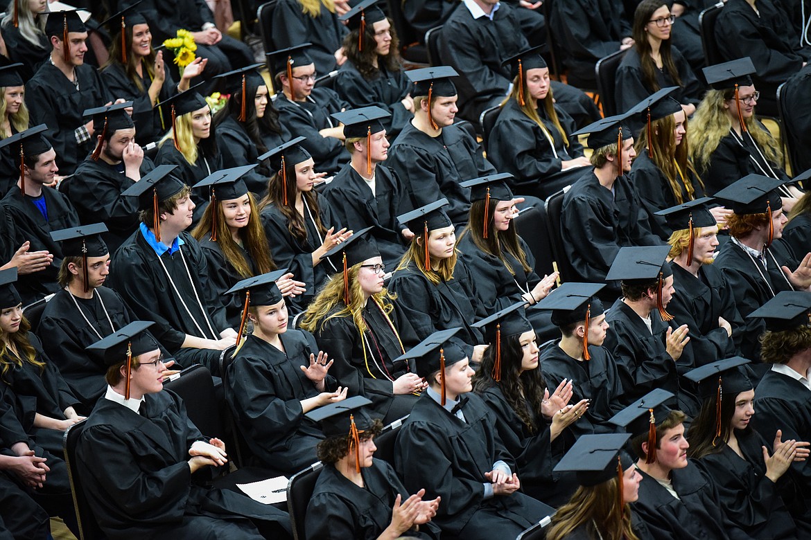 Graduates applaud after the commencement address at Flathead High School's  graduation ceremony in this Friday, June 3, 2022 file photo. (Casey Kreider/Daily Inter Lake FILE)