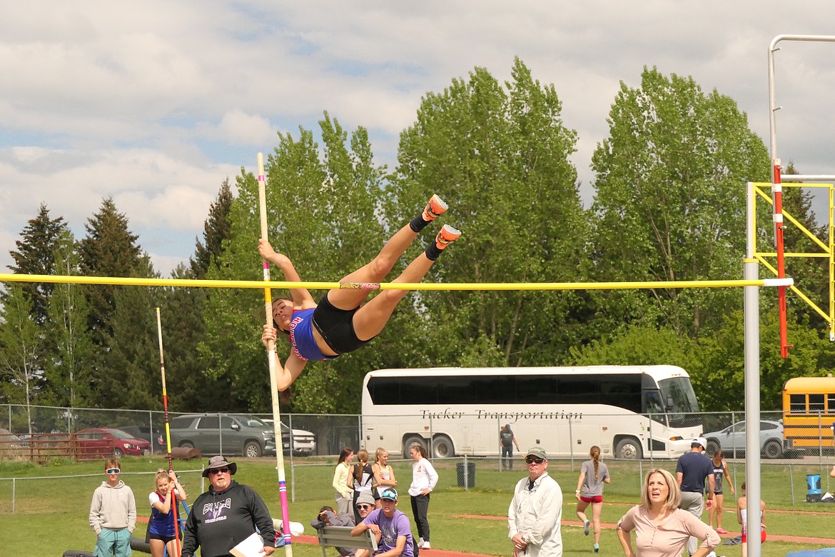 Superior's Isabella Pereira clears the bar on her way to first place in the women's pole vault competition at Saturday District 14C championship meet in Missoula. (Chuck Bandel/VP-MI)