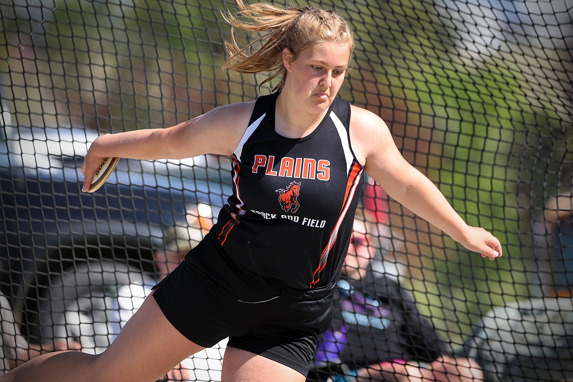 Alexis Deming of Plains set a new personal record of 124 feet, 4 inches to win the discus at the 7B District Meet in Eureka Saturday. (Jeremy Weber/Bigfork Eagle)