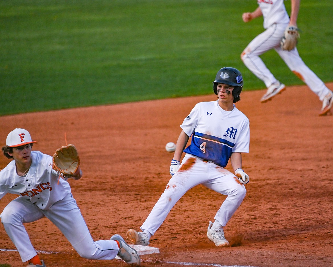 Mission's Rhain Gonzales is safe during last Wednesdays game against Frenchtown. (Christa Umphrey photo)