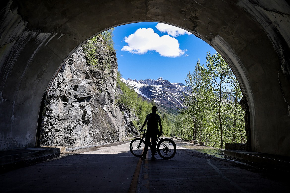 A biker, George from Macedonia, looks out from the tunnel below the loop on Monday. (JP Edge photo)