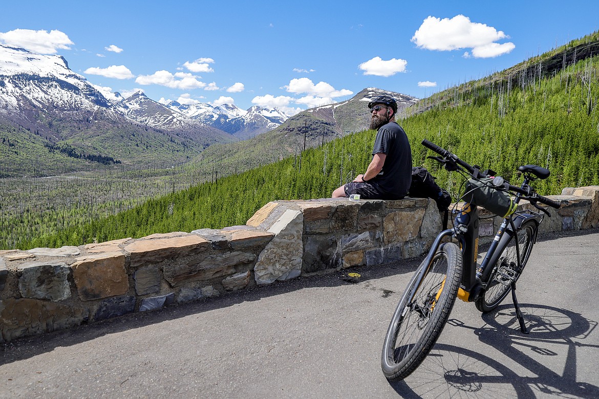 Scott Sorenson takes a break at the loop to enjoy the view on Monday. (JP Edge photo)