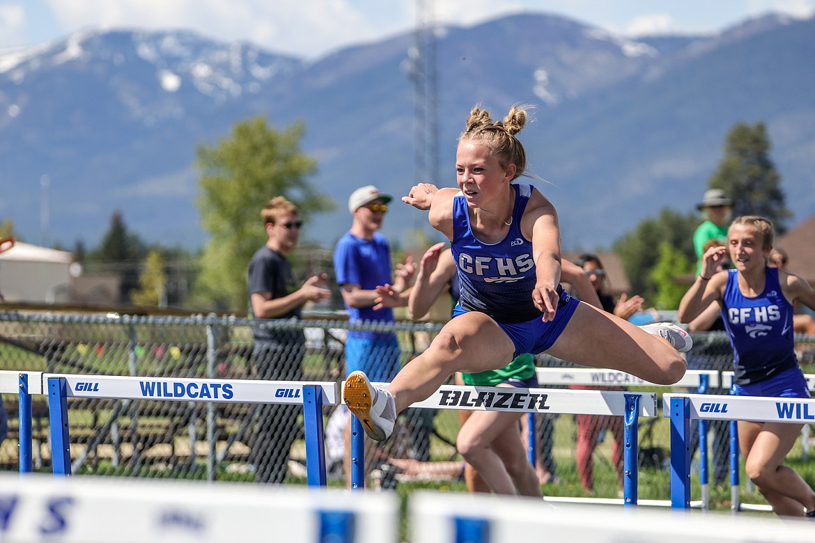 Courtney Hussion competes in the 100 hurdles at home last week. (JP Edge photo)