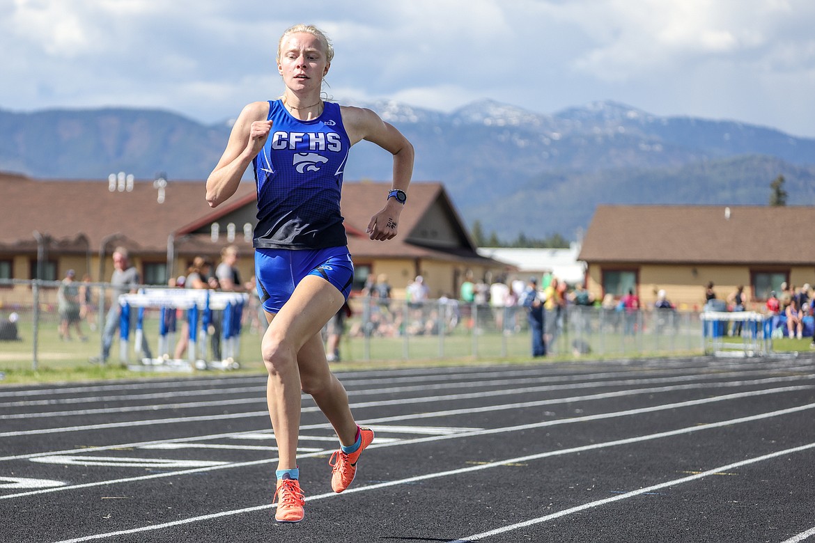 Siri Erickson takes first in the 800 at the Cats-Pack dual last week at home. (JP Edge photo)