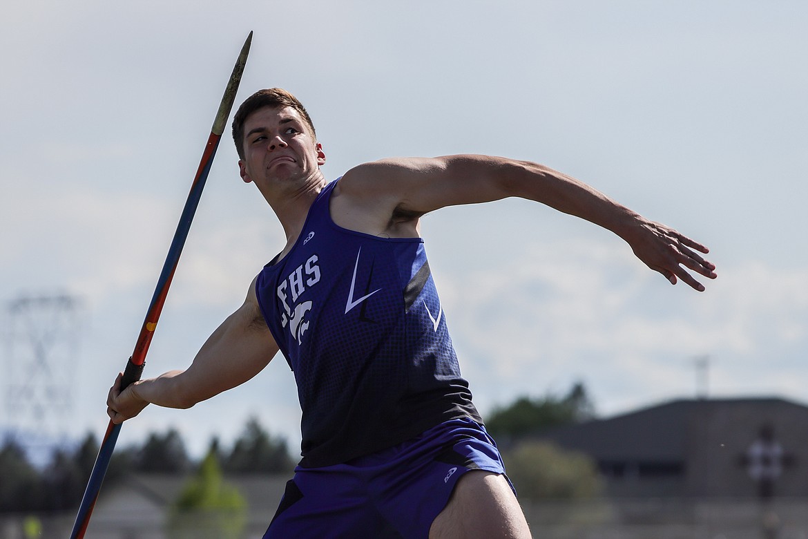 Bryce Dunham throws the javelin last week at home. (JP Edge photo)