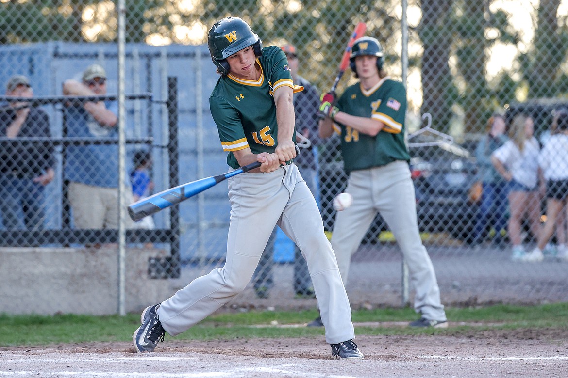 Logan Kunz swings over the plate in Columbia Falls last week. (JP Edge photo)