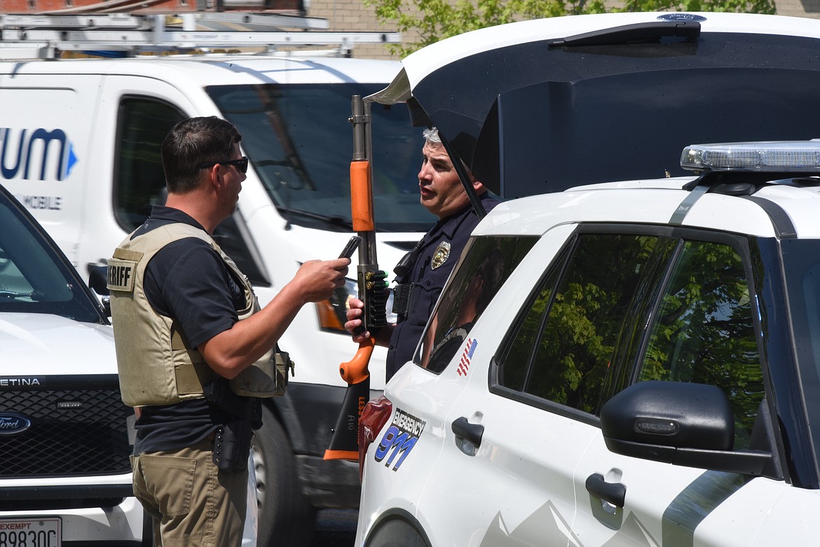 The Flathead County Sheriff's Office and Kalispell Police Department, working alongside security personnel inside Flathead County District Court, responded to a report of a man wielding a knife on the third floor of the Flathead County Justice Center on Tuesday, May 16. (Derrick Perkins/Daily Inter Lake)