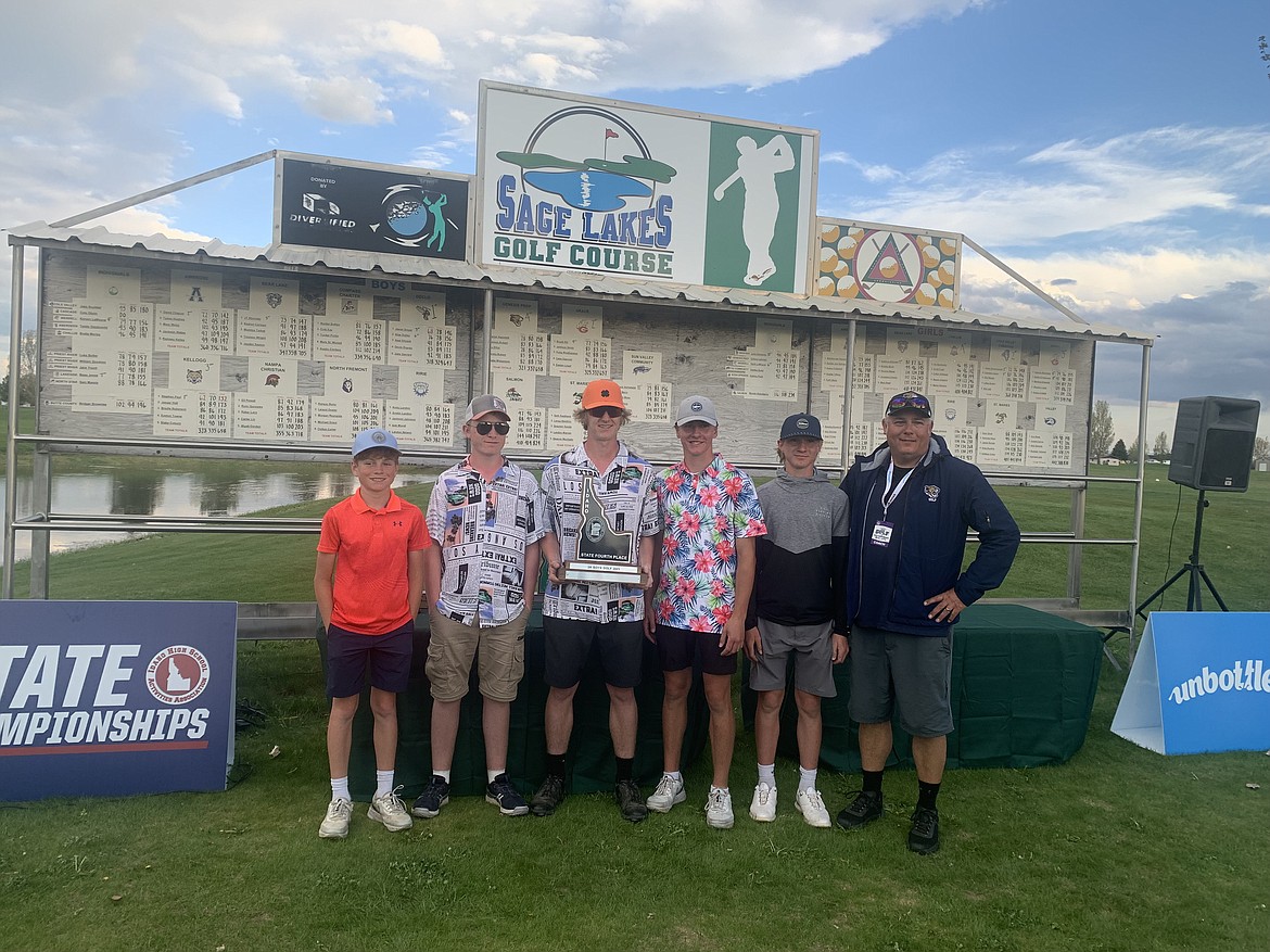 Courtesy photo
The Genesis Prep Academy boys brought home a trophy for its fourth-place finish at the state 2A golf tournament at Sage Lakes Golf Course in Idaho Falls. From left are Byron Hammett, Gabe Missamore, CJ Elliott, Carson Rubert, Brady Rubert and coach Tom Tucker.