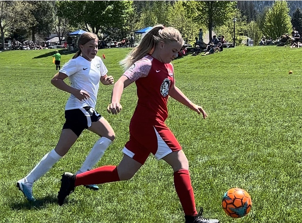 Photo by JULIE SPEELMAN
Eloise Elgee of the Thorns girls U11 soccer team dribbles the ball to goal during the Bill Eisenwinter Hot Shot Tournament last weekend. The Thorns beat the Missoula Strikers 2-1 last Saturday, with Eloise Elgee scoring a goal. The Thorns then lost 6-0 to FC Missoula. On Sunday, the Thorns tied Hells Canyon FC 2-2, with Gracie McVey scoring for the Thorns.