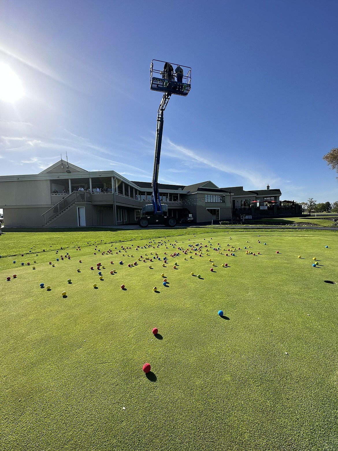 The Great Genie Ball Lift is a side game where board of directors chairman Jim McKiernan drops numerous balls onto a practice green, and the winning ball earns money.