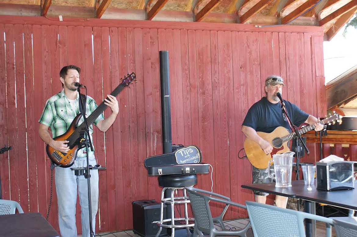 Dose, a local duo, donated their time to play and entertain the attendees of the Yaak WINGS fundraiser on Saturday, May 13. (Photo courtesy Larry Miller)