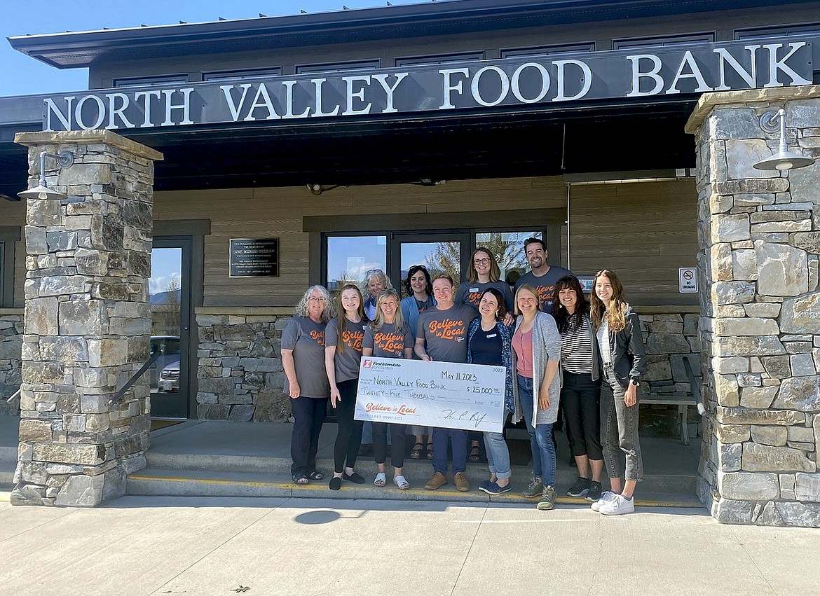 A crew from First Interstate Bank in Whitefish presents a check to North Valley Food Bank as part of the bank’s Believe in Local campaign. (Courtesy photo)