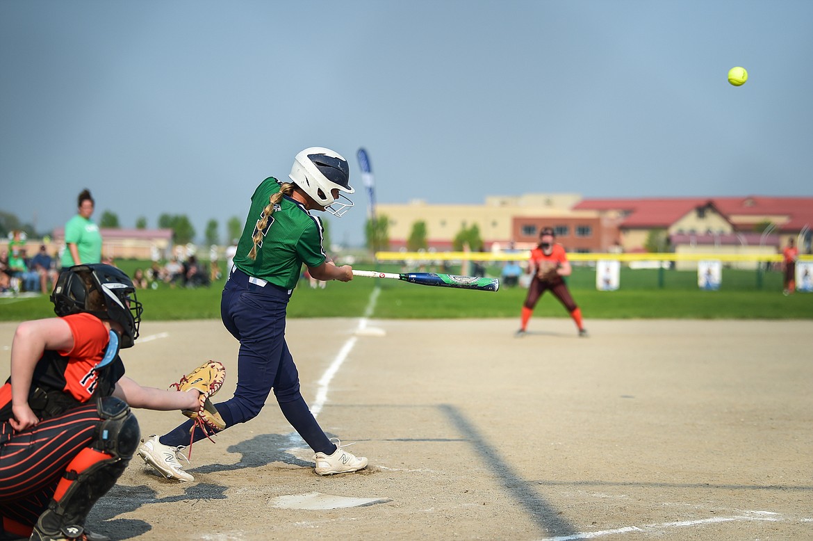 Glacier's Kenadie Goudette (2) connects on a two-run home run in the fourth inning against Flathead at Glacier High School on Thursday, May 18. (Casey Kreider/Daily Inter Lake)