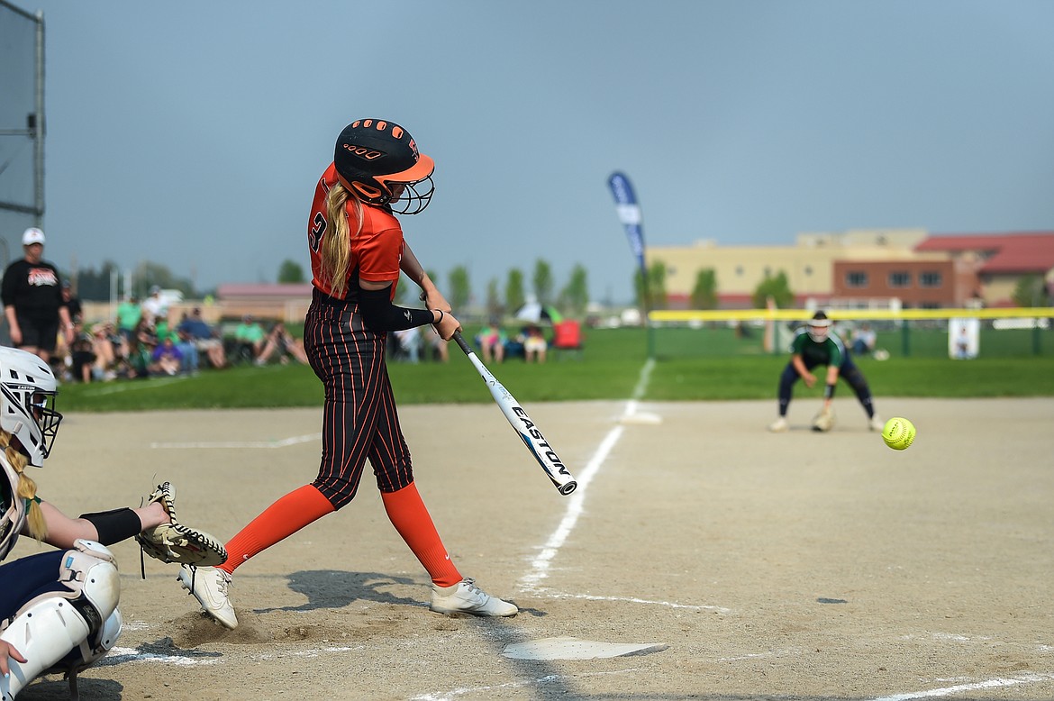 Flathead's Macey McIlhargey (3) singles in the second inning against Glacier at Glacier High School on Thursday, May 18. (Casey Kreider/Daily Inter Lake)