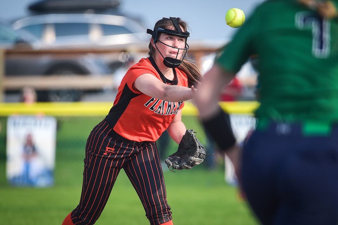 Flathead second baseman Ava Bessen (16) throws out Glacier's Cazz Rankosky (7) after a grounder at Glacier High School on Thursday, May 18. (Casey Kreider/Daily Inter Lake)