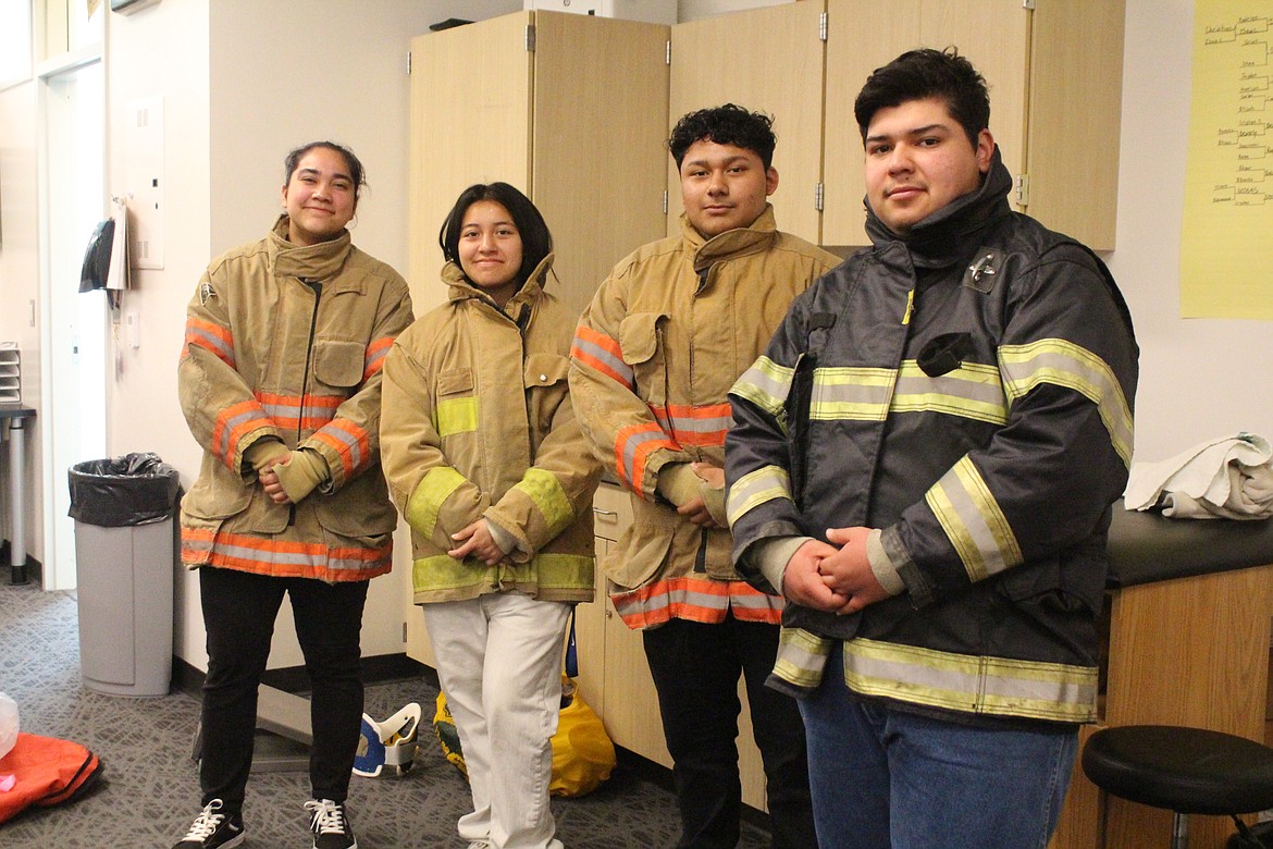 From left, Yanetzi Gonzalez, Genesis Franco, Mario Guerrero and Marcelo Moreno said the fire science class at Quincy High School has given them the opportunity to determine if firefighting is the career for them - and it is.