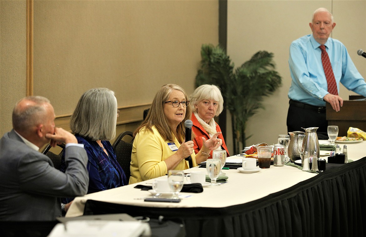 Dr. Kristine Hoover speaks during the Kootenai County Task Force on Human Relations' luncheon at the Best Western Plus Coeur d'Alene Inn on Thursday. She is joined by, from left, Jeff Crowe, Marcia Franklin, Dr. Kathy Canfield-Davis and Tony Stewart.