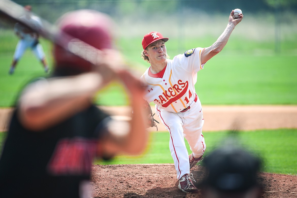 Kalispell Lakers A starting pitcher Jackson Heino (14) delivers against the Cranbrook Bandits in the Canadian Days Tournament at Archie Roe Field on Friday, May 19. (Casey Kreider/Daily Inter Lake)