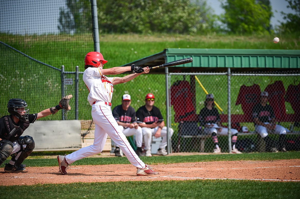 Kalispell Lakers A's Bryce Buckmaster (17) drives in a run with a single against the Cranbrook Bandits in the Canadian Days Tournament at Archie Roe Field on Friday, May 19. (Casey Kreider/Daily Inter Lake)
