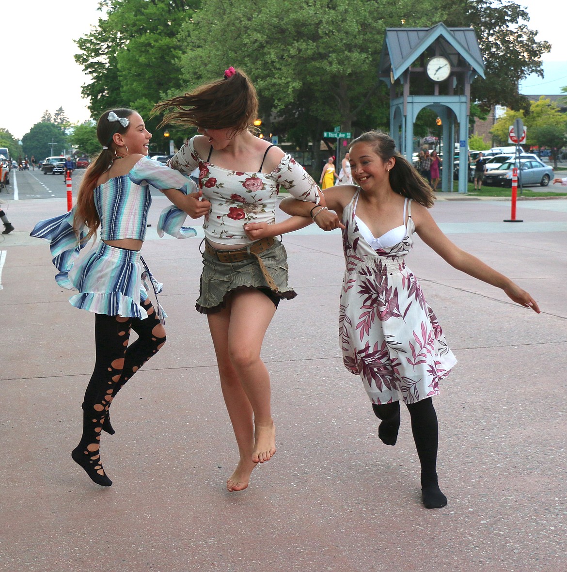 A trio has fun dancing to the music at the Lost in the '50s street dance on Friday night.
