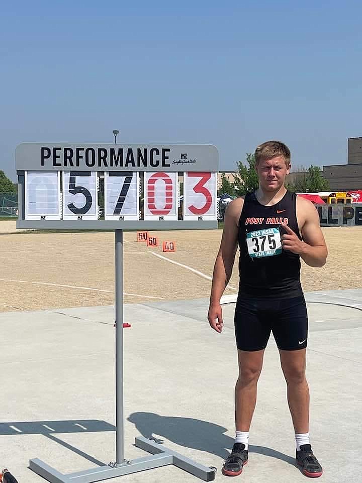 Courtesy POST FALLS BOOSTER CLUB
Post Falls High senior Trevor Miller won the state 5A boys shot put championship with a throw of 57 feet, 3 1/4 inches at Mountain View High in Meridian on Friday.