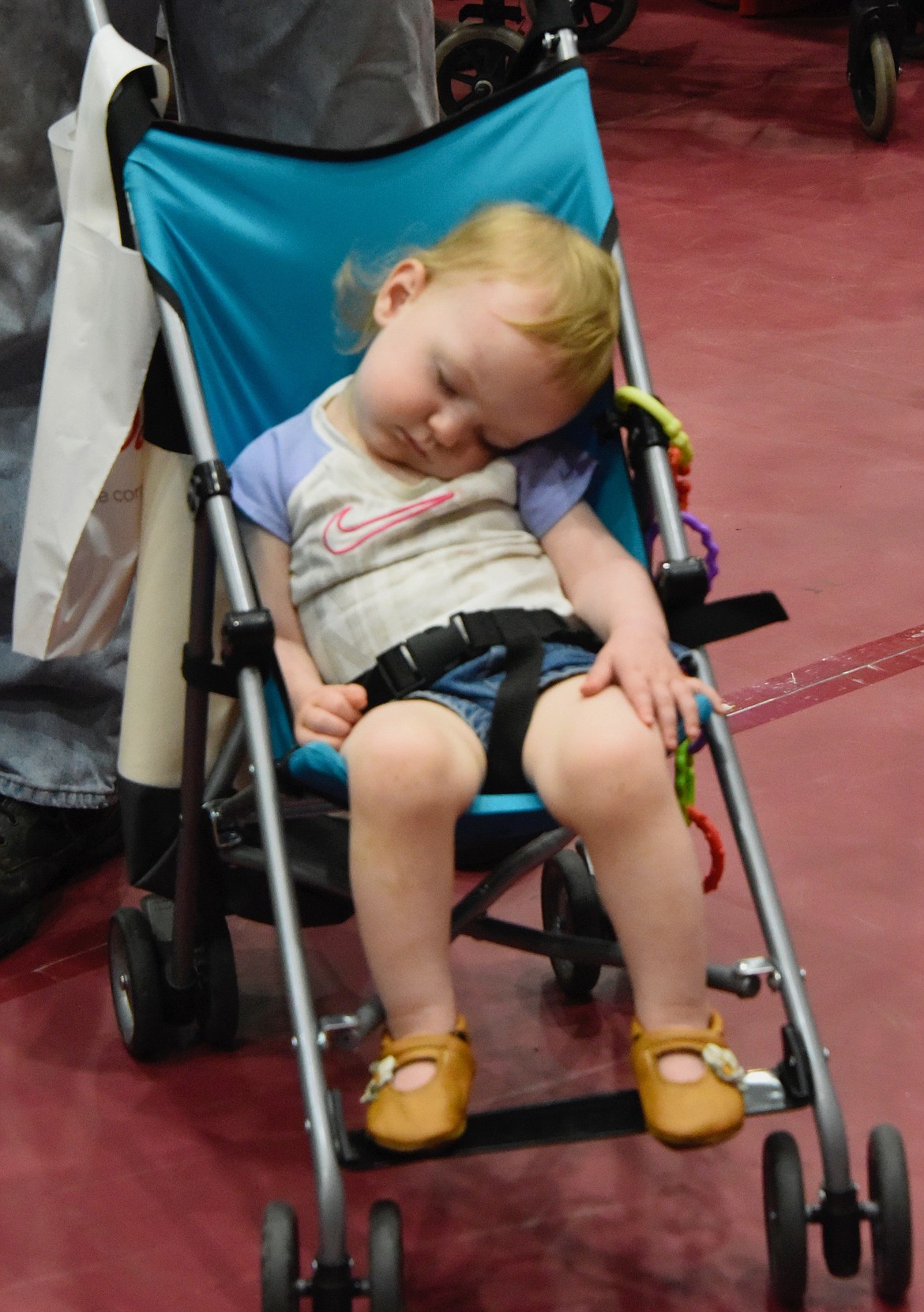 Young visitor naps through Women 4 Wellness. (Berl Tiskus/Leader)