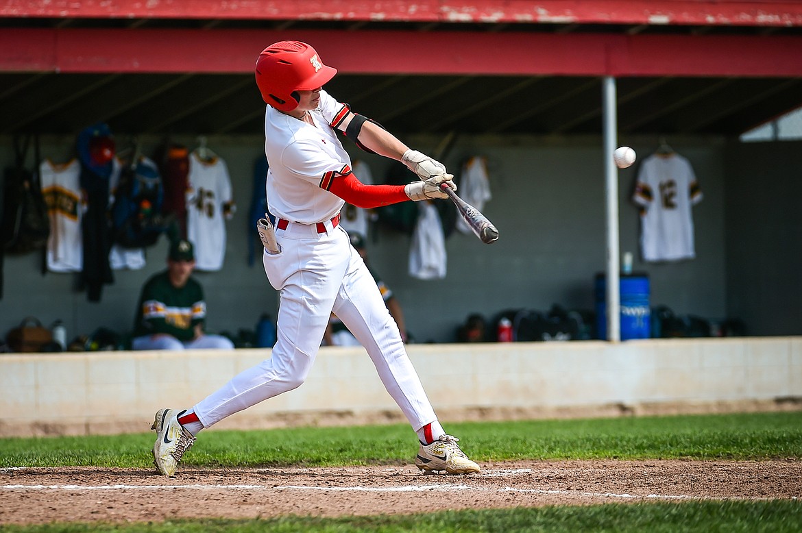 Kalispell Lakers AA's Carter Schlegel connects on an RBI double in the first inning against the Sherwood Park AAA Athletics in the Canadian Days Tournament at Griffin Field on Saturday, May 20. (Casey Kreider/Daily Inter Lake)