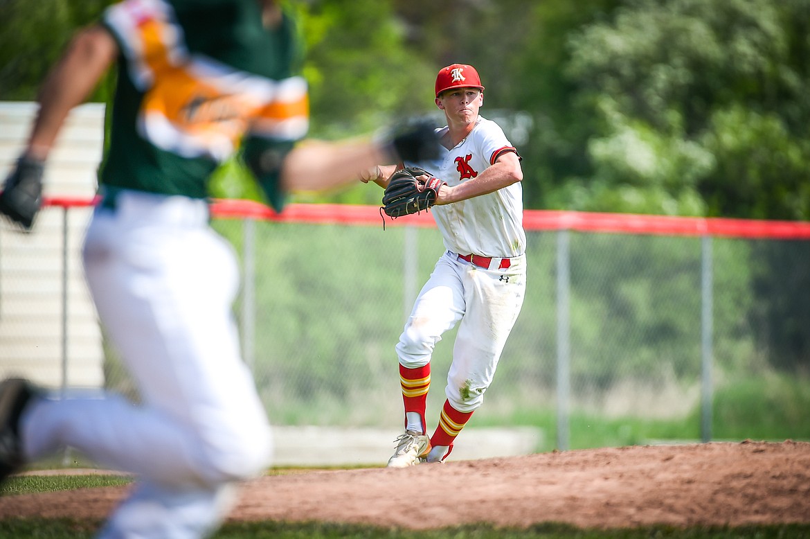 Kalispell Lakers AA third baseman Adam Nikunen (2) throws out a Sherwood Park AAA Athletics runner at first after fielding a grounder in the Canadian Days Tournament at Griffin Field on Saturday, May 20. (Casey Kreider/Daily Inter Lake)