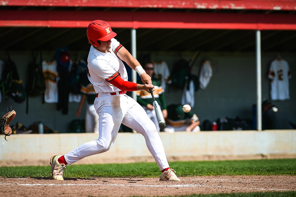 Kalispell Lakers AA's Max Holden (15) connects on an RBI triple in the first inning against the Sherwood Park AAA Athletics in the Canadian Days Tournament at Griffin Field on Saturday, May 20. (Casey Kreider/Daily Inter Lake)