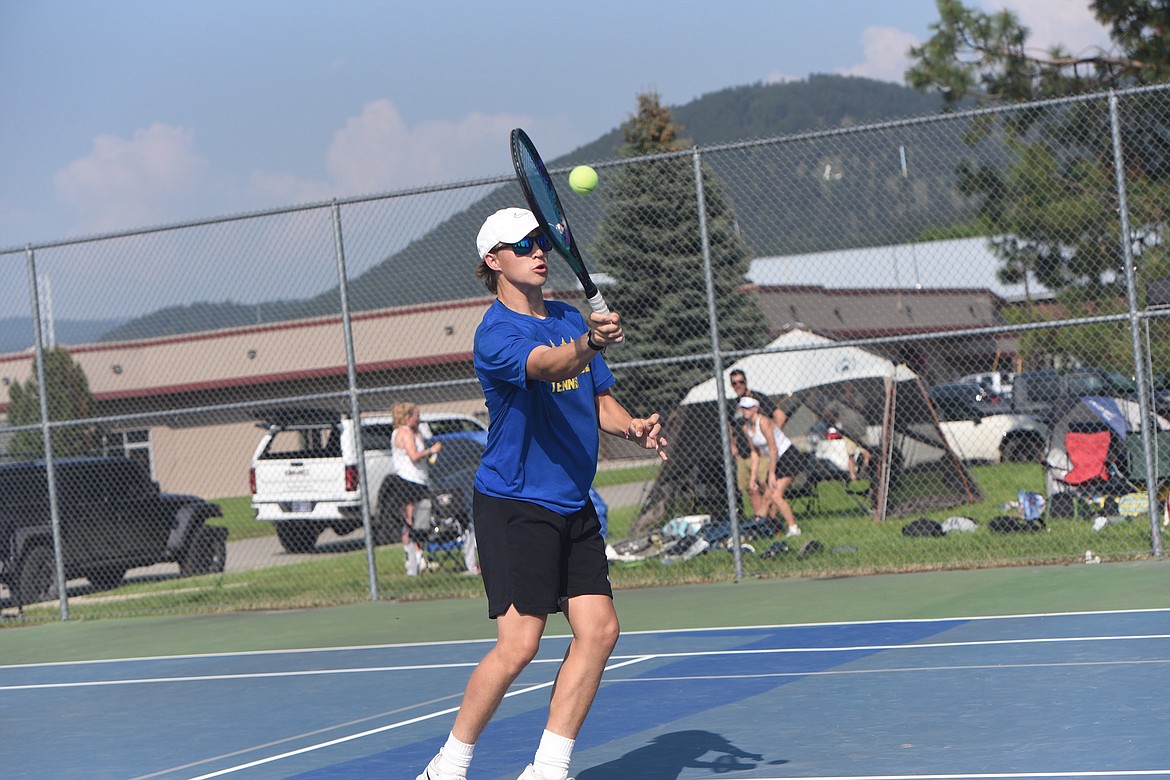 Libby tennis player Alderic Martineau competes in the Class A Northwest Divisional tournament on May 19. (Scott Shindledecker/The Western News)