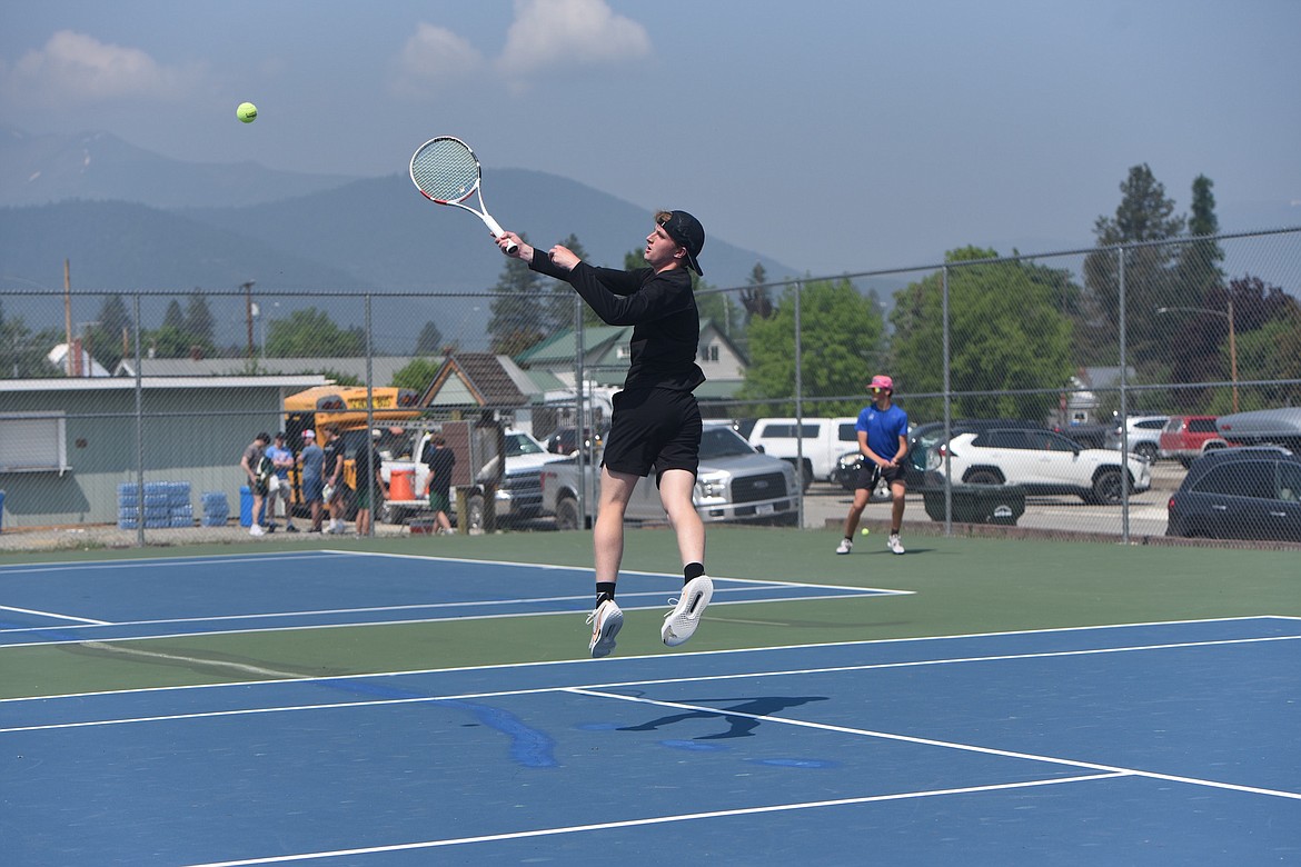 Libby tennis player Ryan Beagle competes in the Class A Northwest Divisional tournament on May 18. (Scott Shindledecker/The Western News)