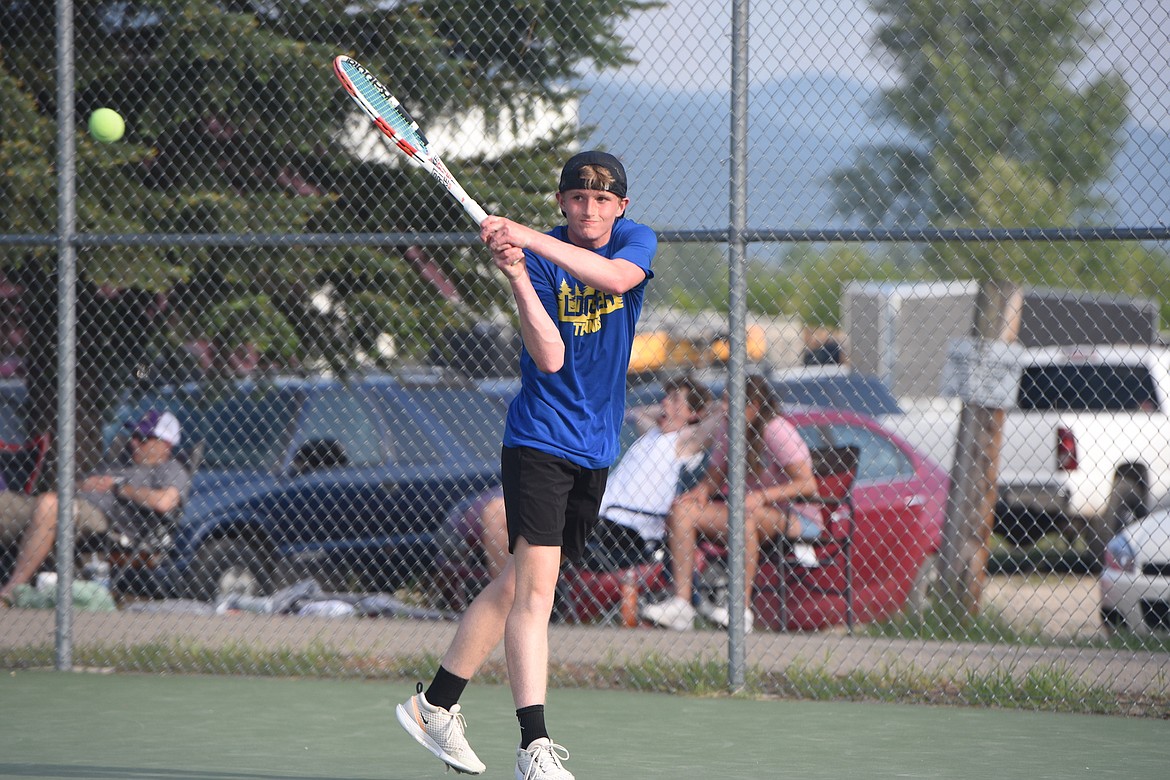 Libby tennis player Ryan Beagle competes in the Class A Northwest Divisional tournament on May 19. (Scott Shindledecker/The Western News)