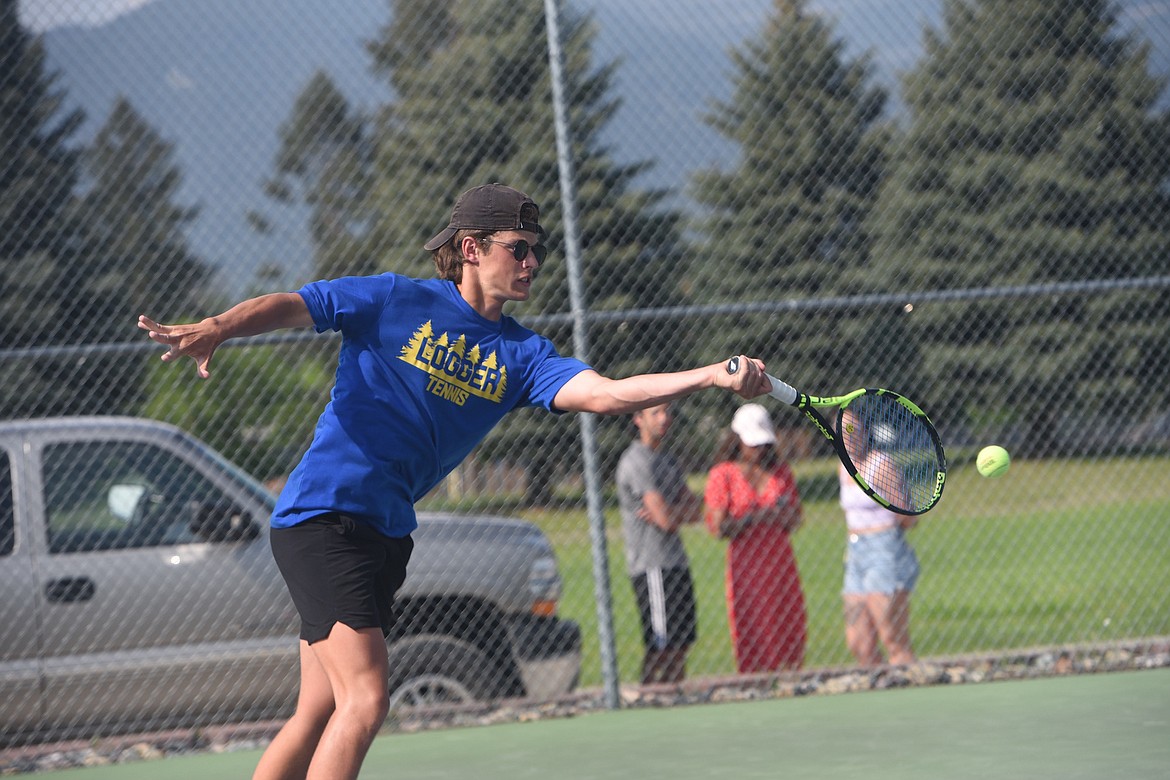 Libby tennis player Trevor Collins competes in the Class A Northwest Divisional tournament on May 19. (Scott Shindledecker/The Western News)