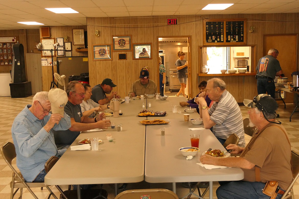 A group of Plains area veterans have lunch and visit during the VFW Auxiliary's once a month Veterans Appreciation Lunches at the Wild Horse Plains VFW. (Chuck Bandel/VP-MI)