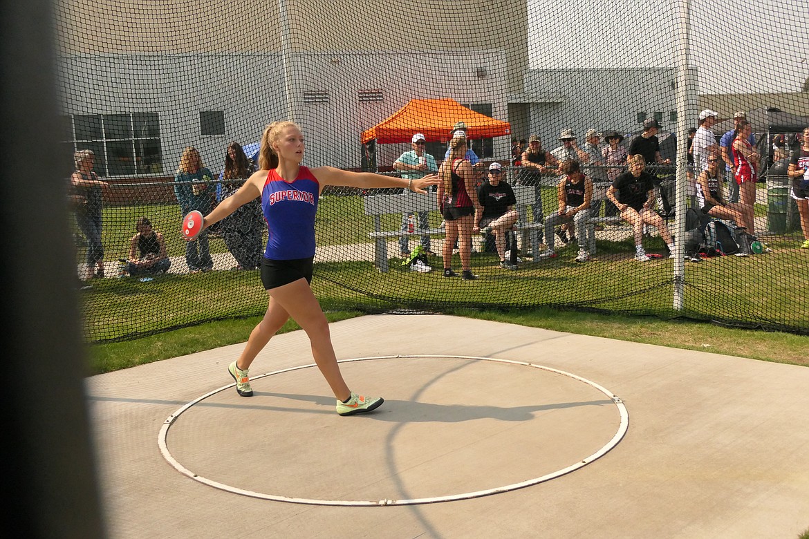 Superior discus thrower Eddy Betts uncorks a throw during competition at the Western C Divisional track and field meet this past weekend in Missoula.  Chuck Bandel/MI-VP0