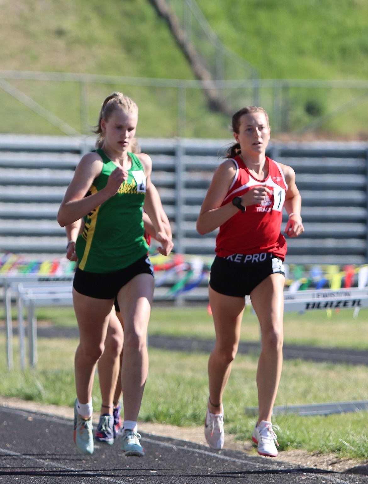 Maren Davidson leads after the first lap of the 800-meter run at the 4A regional championship earlier this season.